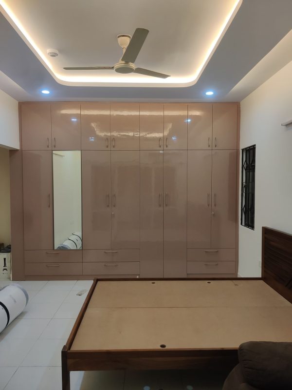 Wardrobe with Loft & Cabinet Work in Bhopal – Completed by The Sofa Shoppe | Tiwari Interiors