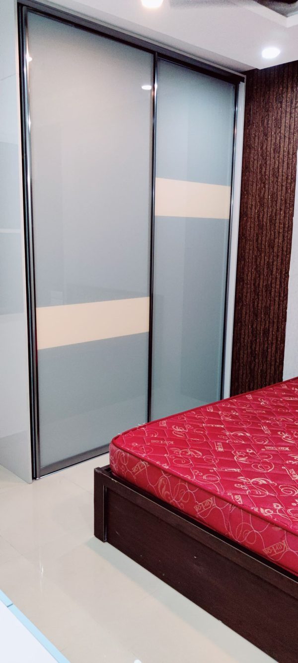 Wardrobe with Loft & Cabinet Work in Bhopal – Completed by The Sofa Shoppe | Tiwari Interiors