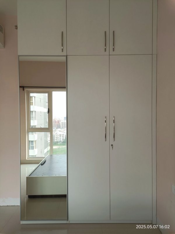 Wardrobe with Loft & Cabinet Work in Bhopal – Completed by The Sofa Shoppe | Tiwari Interiors